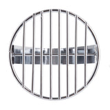 A round, shiny chrome plated grill grate with parallel bars sits above a reflective silver base. The view from above highlights the evenly spaced vertical bars and the geometric, clean design against a white background. Dishwasher safe for easy cleaning.