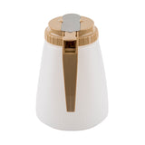 A BPA free, beige and white plastic All Purpose Dispenser with a textured body, beige handle, and matching flip-top lid with silver spout cover, designed for pouring liquids. Made in USA. Shown against a plain white background.