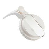 A white plastic TableCraft handheld food slicer with a round base, ridged edges, a hinged metal blade on top, and a curved handle for pressing down and slicing. Its simple design is functional for small kitchen tasks and is dishwasher safe.