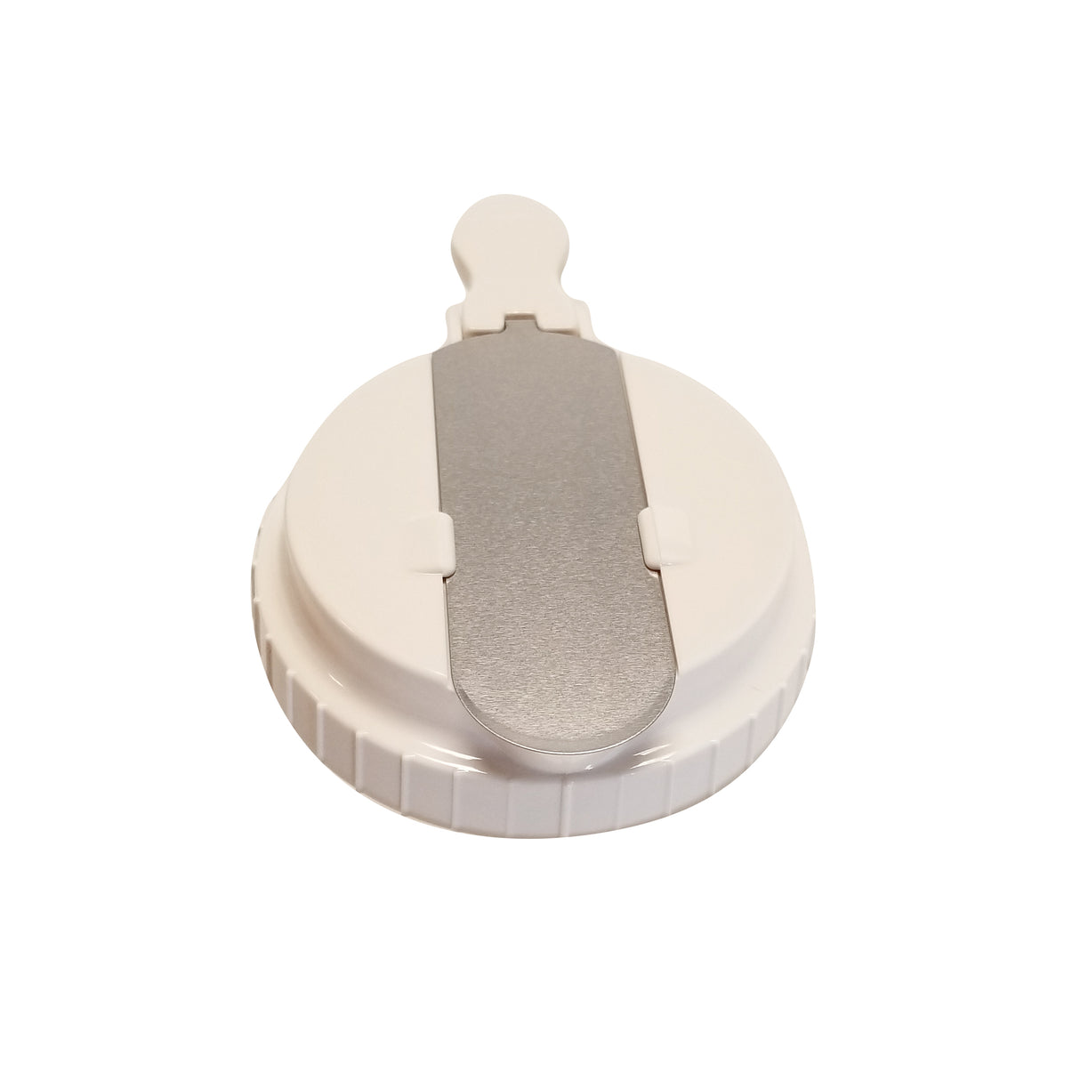 A round, white plastic dispenser top with a ridged edge features a flat, metallic, rectangular tab with a rounded end attached at the center. Likely from TableCraft, it serves as a tamper-evident closure. The background is plain white.