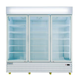 A large Empura commercial refrigerator features three sections with adjustable shelves, clear glass swing doors, and bright interior lighting. This refrigerated merchandiser is empty, white, and perfect for showcasing chilled products.