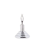A shiny, stainless steel ring holder shaped like a small, tiered pedestal with a pair of upward-facing, clasped fingers at the top. The plain white background makes this elegant TableCraft piece the clear focal point of the image.