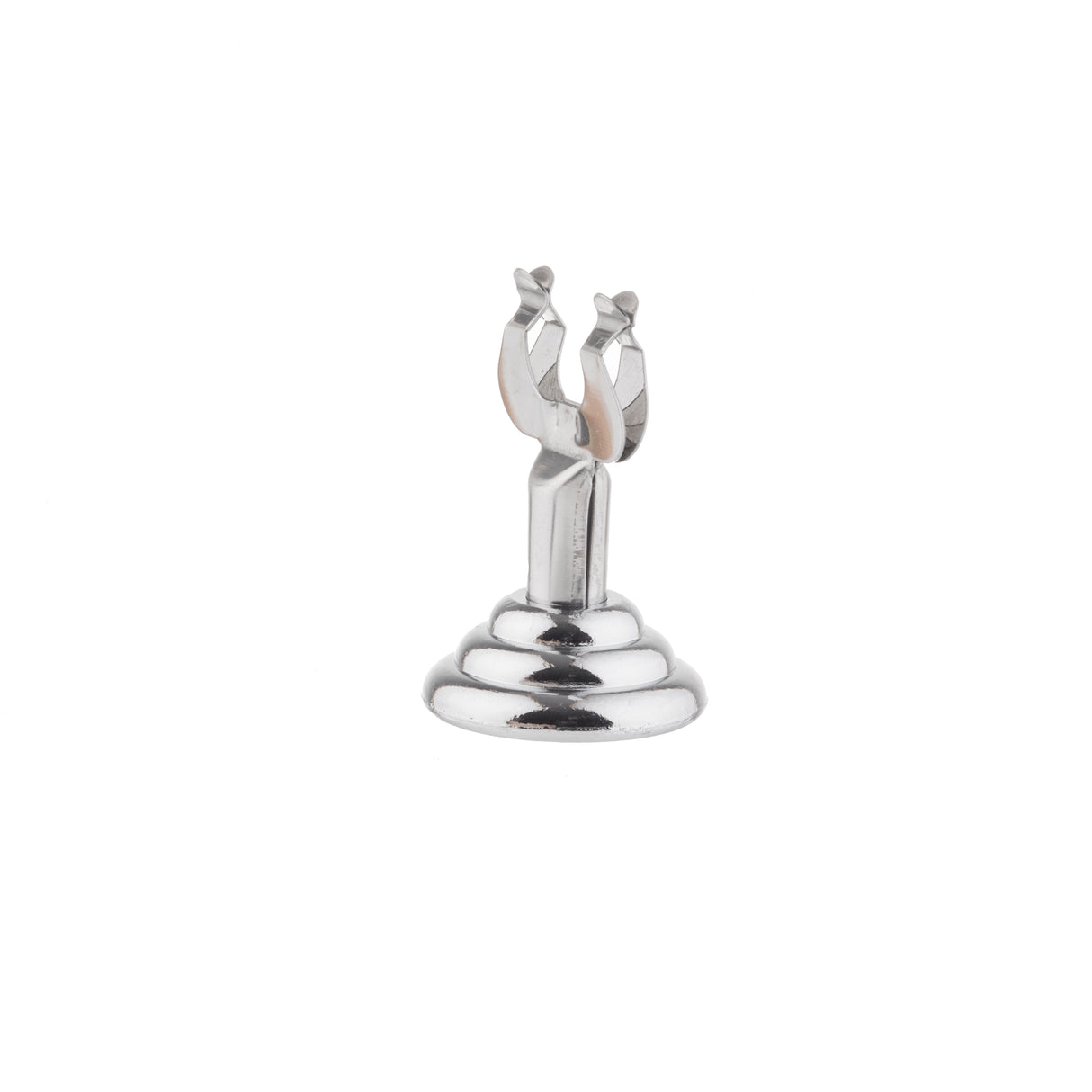 A small, shiny stainless steel object with a round, tiered base and an upright claw-like card holder at the top, resembling a miniature trophy or decorative stand, is centered on a plain white background.