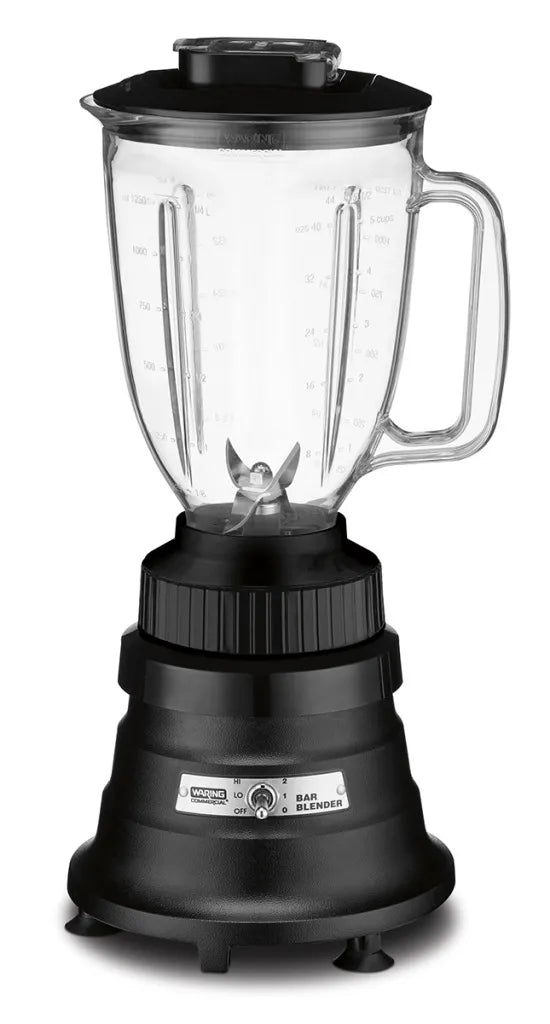 A countertop Bar Blender with a clear 1.3 liter copolyester container, lid, and handle sits on a sturdy black motor base featuring a speed dial and silver Bar Blender label. The pitcher has measurement markings and stainless steel blades inside.