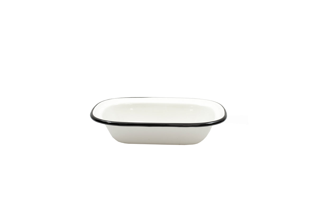 A small, rectangular white Enamelware Serving Pan with rounded edges and a black rim. Plain and empty, it sits against a white background, crafted from porcelain enamel coated steel and is dishwasher safe for easy cleaning.
