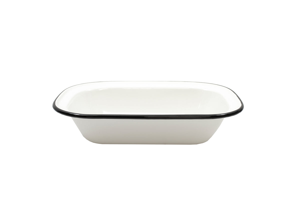 A rectangular white enamelware serving pan with slightly rounded corners and a black rim, photographed on a plain white background. Made from porcelain enamel coated steel, this dish is empty, glossy, and dishwasher safe.