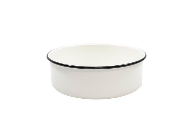 A plain, round, white ceramic bowl with a smooth surface and a thin black rim around the top edge sits on a white background. Reminiscent of classic enamelware serving tray designs, the bowl features a simple, minimalist style.