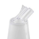 A close-up of the top of a white electric appliance with two BPA free, clear plastic nozzles angled upward, likely a nasal irrigator or water flosser attachment. The background is plain white, highlighting the transparent nozzles.