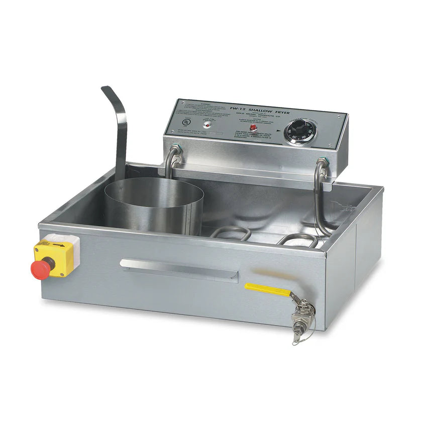 A stainless steel commercial funnel cake fryer with a control panel, red emergency stop button, front faucet, and cylindrical metal container; a metal handle rests on the fryer’s edge against a white background.