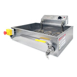 A rectangular stainless steel electric fryer with a visible heating element, control panel with knob and buttons, prominent emergency stop button on the side, yellow-handled drain valve at the front, and safety warning labels attached to the side.