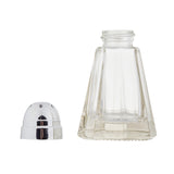 A clear, empty, faceted glass Salt & Pepper Shaker sits on a white background with its dome-shaped stainless steel top, featuring small holes for dispensing, placed beside it and not attached.