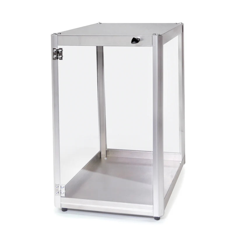 A rectangular, open-sided metal enclosure with a swing-open glass door, a latch on top, and a flat bottom. Featuring stainless steel construction and adjustable feet, this minimalist display case resembles a small equipment cabinet against a plain white background.