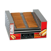 A commercial hot dog grill featuring stainless steel rollers with rows of hot dogs cooking. Red panels display images and “HOT DOGS” text, while dual temperature zones, two control knobs, and safety labels are present on the front.