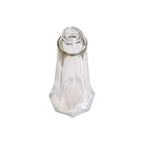 A clear, empty, faceted glass salt and pepper shaker jar with a wide neck and no lid is viewed from a high angle on a white background. This replacement jar features a hexagonal base and tapers upward for an elegant, geometric look.