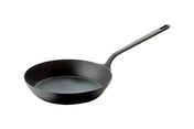 A black, round carbon steel fry pan with gently sloped sides and a long handle is shown on a white background. Ideal for induction cooking, the handle features a small hole at the end for hanging storage. The interior appears uncoated metal.