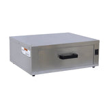 A stainless steel heated bun cabinet from Gold Medal Products with a rectangular shape, black plastic handle, and a small control panel on the right side. The drawer sits on four small feet, with a warning label on the left side panel. Plain white background.