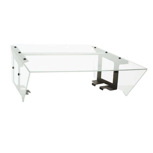 A modern, rectangular glass coffee table with angled edges and black metal supports. Its clear tabletop and sides, combined with visible black hardware, evoke a Food Shield aesthetic for a sleek, geometric look reminiscent of an NSF roller grill cover.