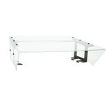 A modern, transparent glass desk with a wide rectangular surface features a unique angular design, resembling the sleek lines of an NSF food shield. Black metal brackets and supports provide stability, creating an airy, minimalist appearance.