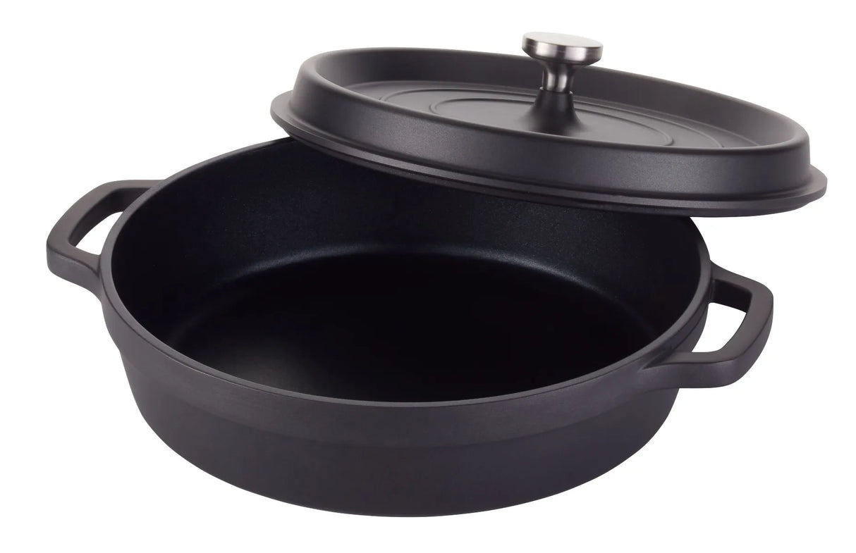 A black, round Ironlite Casserole Dutch oven with two side handles is shown with its lid partially lifted, revealing the empty interior. The matte-finish pot is ideal for induction cooking and features a metallic knob on the lid for easy handling.