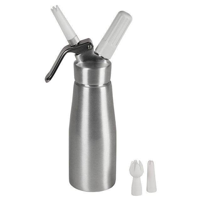 A Chef Master whipped cream dispenser with a lever handle and white plastic nozzle is displayed upright, along with two additional nozzle tips, all designed for professional use on a plain white background.