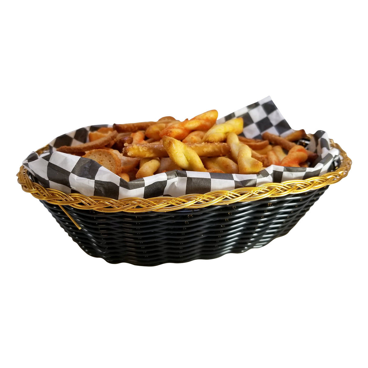 A hand-woven black basket with gold trim, lined with black-and-white checkered paper, filled with golden brown French fries of varying size and crispiness. The basket is isolated on a white background.