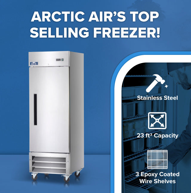 A stainless steel reach-in freezer stands on wheels against a blue background. Text reads “Arctic Air’s Top Selling Freezer!” Features listed are: stainless steel, 23 ft³ capacity, and 3 epoxy coated wire shelves, with matching icons next to each.