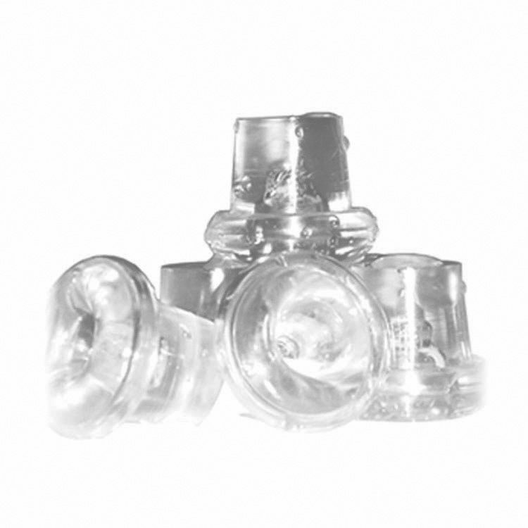 Four clear, round plastic earbud tips are stacked on a white background, their slightly transparent design reminiscent of cubes in a Hoshizaki ice maker. The tips overlap loosely, showing off their flared edges and hollow interiors.