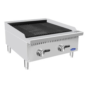 A stainless steel CookRite Charbroiler with two control knobs, grill grates on top, and four short legs. This countertop charbroiler features a clean, industrial design suitable for professional kitchens. A small blue and white logo is visible on the front.