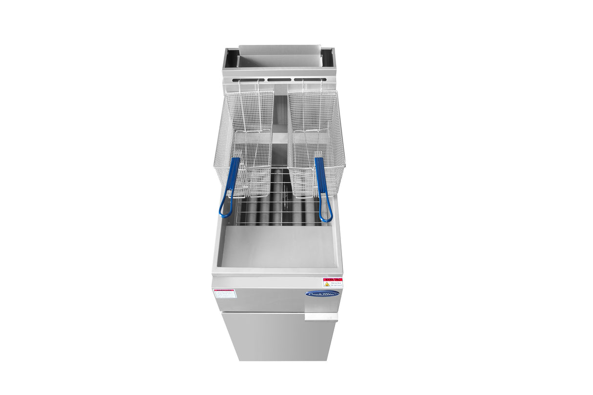 A top-down view of a 50 lb. capacity commercial deep fryer with two metal frying baskets featuring blue handles. The stainless steel deep fryer, powered by natural gas, has visible heating elements and sits against a plain white background.