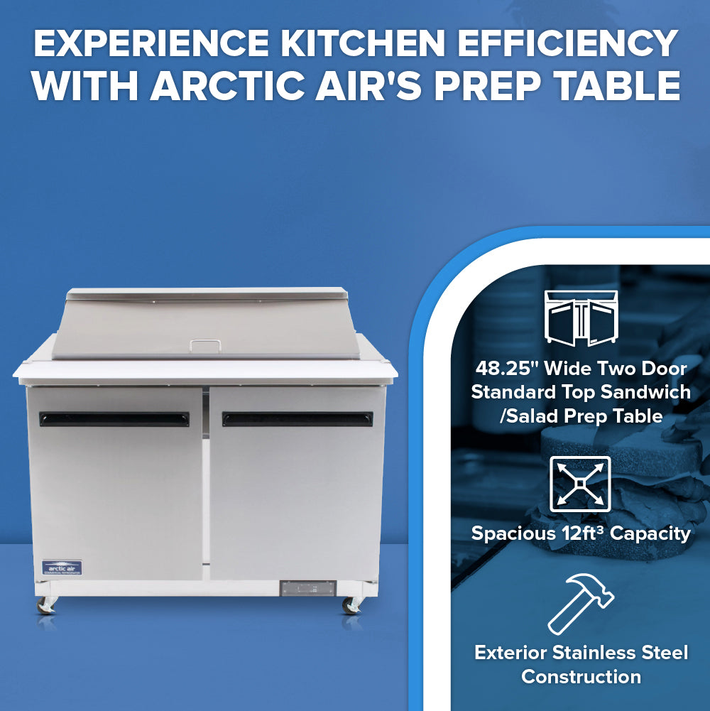 A stainless steel Arctic Air AST48R salad prep table sits in front of a blue background. Text above reads, Experience kitchen efficiency with Arctic Air’s sandwich prep table. On the right, features are listed with icons: 48.25” width and 12 cu. ft. capacity.