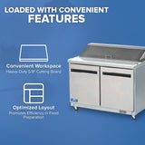A stainless steel salad prep table with two doors, a lift-up lid, and a built-in cutting board is shown on a blue background. Text highlights a “Convenient Workspace” and “Optimized Layout” for efficient food preparation.