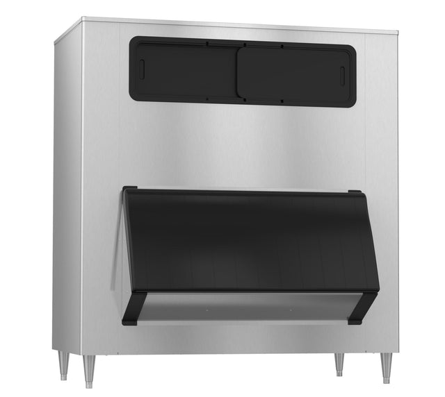 A commercial stainless steel ice machine with a large black sliding door at the front for ice access and an integrated ice bin for ample ice storage. The appliance stands on four metal legs and features a sleek, industrial design.