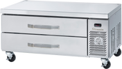 A commercial stainless steel Refrigerated chef base with two pull-out drawers and a vented section on the right, fitted with four caster wheels for mobility. The brand name “Thorin” is visible above the vent.