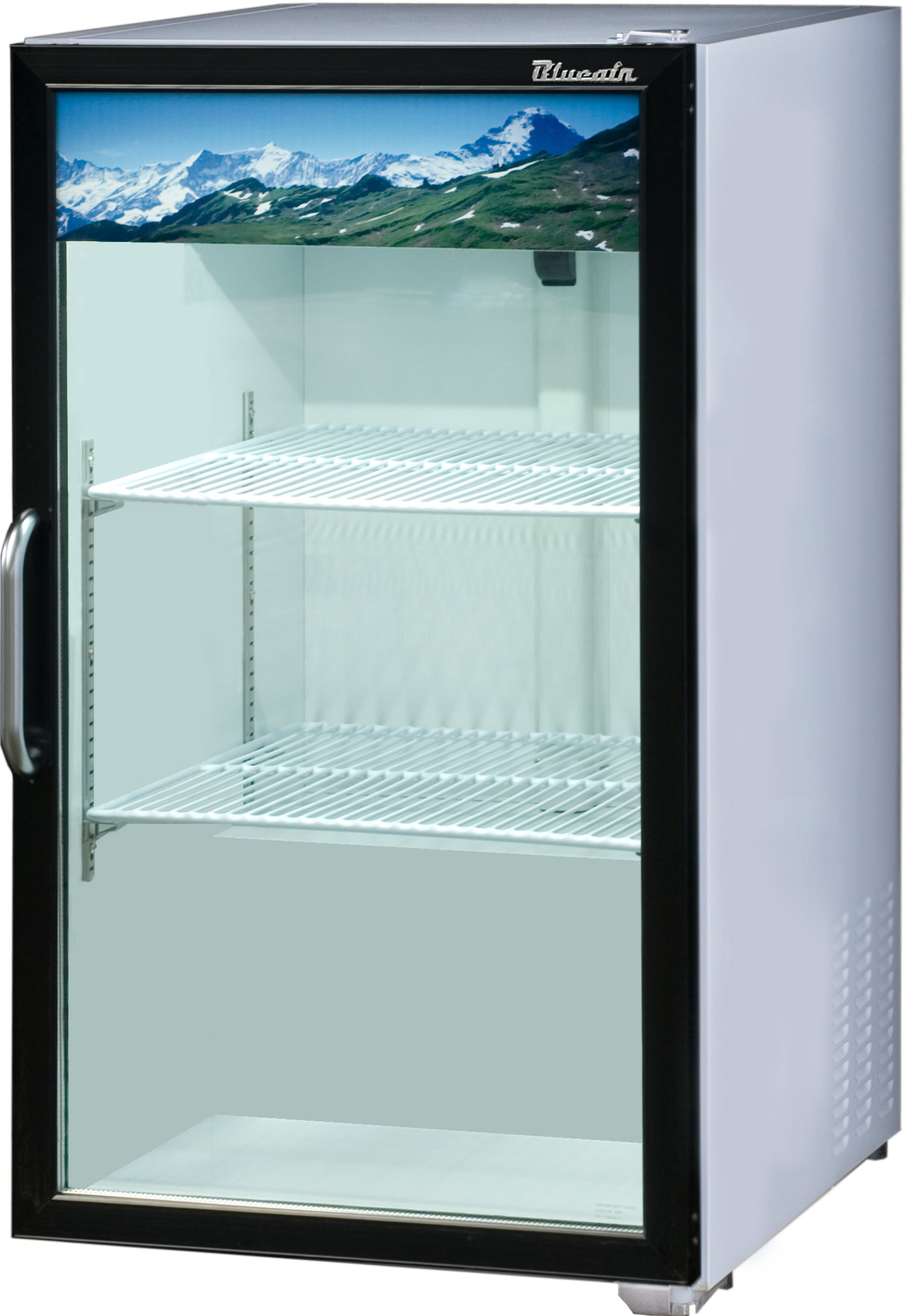 A 7.0 cu. ft. refrigerated merchandiser with a glass door and two wire shelves. The empty, silver fridge features a bright interior and a scenic green landscape with snow-capped mountains on the door, perfect as a countertop display refrigerator.
