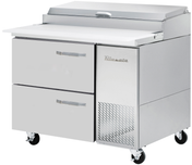 A Blue Air BAPP44-D2-HC refrigerated prep table, this stainless steel unit features two drawers, a door, a closed top lid, and a work surface. Four caster wheels and a vented panel labeled “True” complete this efficient pizza prep table.