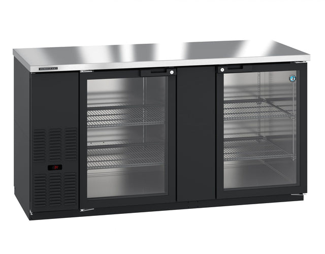A Hoshizaki BB69-G glass door bar cooler, this commercial under-counter refrigerator features a stainless steel top, two glass doors, wire shelves, and a digital temperature display on the left side—all set against a plain white background.
