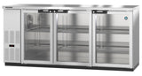A sleek and modern Hoshizaki glass door cooler featuring three transparent doors and empty wire shelves. Its left-side control panel and vent make this refrigerated back bar cooler ideal for any restaurant or bar setting.