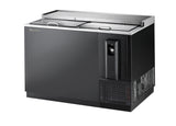 A sleek, industrial 50 inch bottle cooler featuring sliding stainless steel lids, a right-side vented refrigeration unit, and a built-in bottle opener with cap catcher. This commercial unit sits on short legs for easy cleaning underneath.