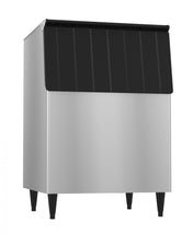 A Hoshizaki commercial stainless steel ice bin with a black, slanted front lid and four short legs. This sleek 500-lb ice storage solution is perfect for restaurants or bars needing to store large quantities of ice efficiently.