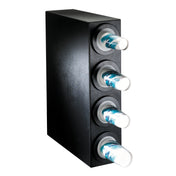 A black rectangular NSF cup dispenser holds four stacks of paper cups, each protruding from a round opening. The white cups feature a blue and teal abstract design. This adjustable cup dispenser is angled against a white background.