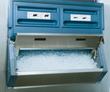 A commercial ice machine with a Flexi-Top system features a stainless steel ice bin that boasts 1000 lbs storage. Blue panels and two instruction stickers with diagrams are mounted on the metallic wall, giving it a clean, industrial look.