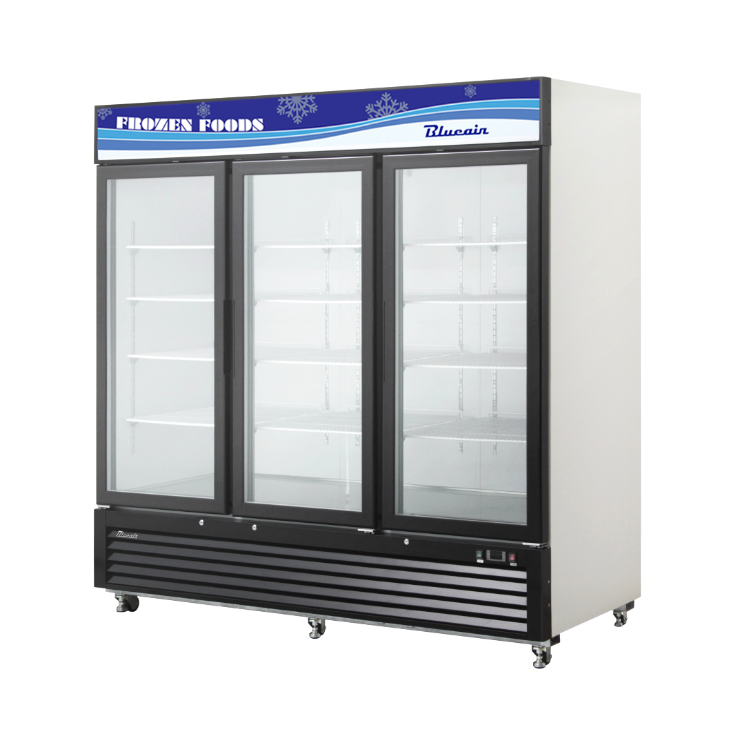 A commercial freezer merchandiser featuring three glass doors with a white exterior, black trim, and a blue “FROZEN FOODS” sign. Each glass door reveals empty white shelves, while ventilation grilles and wheels provide mobility and efficient cooling.