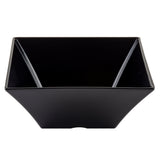 A top-down view of a black, empty, square-shaped melamine bowl with slightly flared, straight sides and sharp corners. The smooth matte Frostone Collection Bowl sits against a plain white background and is dishwasher safe.