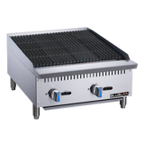 A stainless steel countertop commercial gas charbroiler with black grill grates, two blue-handled control knobs, and four sturdy legs. The front panel features the Bluslama logo. Its boxy, robust design is ideal for professional kitchens.