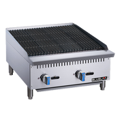 A stainless steel countertop commercial gas charbroiler with black grill grates, two blue-handled control knobs, and four sturdy legs. The front panel features the Bluslama logo. Its boxy, robust design is ideal for professional kitchens.