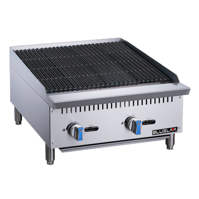 A stainless steel countertop commercial gas charbroiler with black grill grates, two blue-handled control knobs, and four sturdy legs. The front panel features the Bluslama logo. Its boxy, robust design is ideal for professional kitchens.