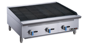 A stainless steel countertop gas charbroiler with three control knobs on the front, black grill grates on top, blue accents on the knobs, and the "Blueline" brand on the lower right corner. The unit features sturdy metal legs.