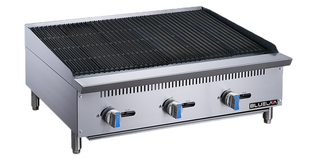 A stainless steel countertop gas charbroiler with three control knobs on the front, black grill grates on top, blue accents on the knobs, and the "Blueline" brand on the lower right corner. The unit features sturdy metal legs.