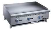 A large stainless steel 36 inch gas griddle with three blue-handled control knobs and short legs. The griddle countertop features ventilation slits on the front and the BLUE FLAME brand name on the right, with a smooth, reflective cooking surface.