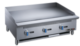 A commercial stainless steel griddle countertop with three blue-handled control knobs, a flat cooking surface, raised sides and back, short legs, and a BLUELINE logo on the front lower right corner. Delivers powerful 90,000 BTU griddle performance.